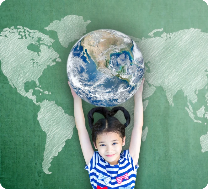 A young girl holding the earth in her hands.